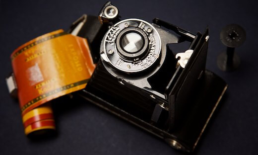 Vintage camera with roll of film