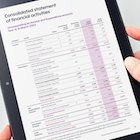 Financial table from the Kidney Research UK annual report, displayed on a tablet screen 